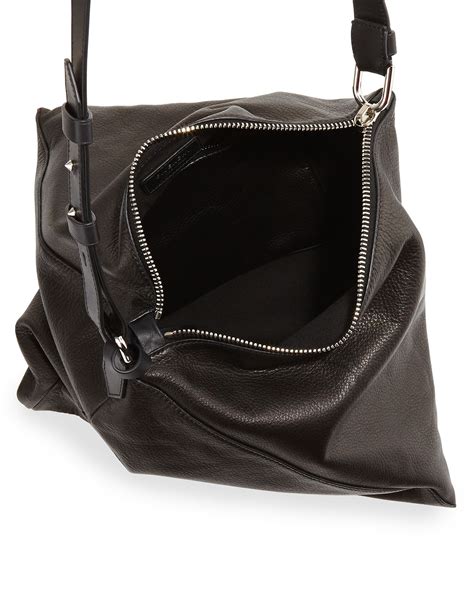 givenchy triangle wristlet